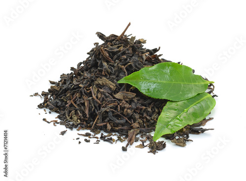 dry black tea leaves isolated on white