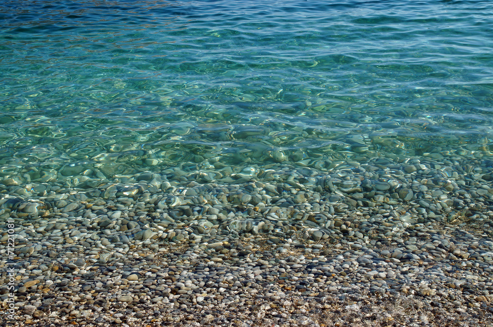 Fototapeta premium Meditation - Klares blaues Meerwasser