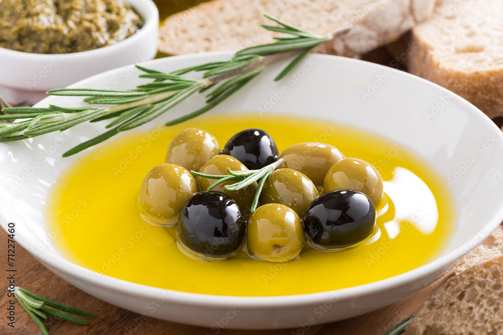 fresh olive oil and Italian snacks, close-up fresh olive oil and Italian snacks, close-up