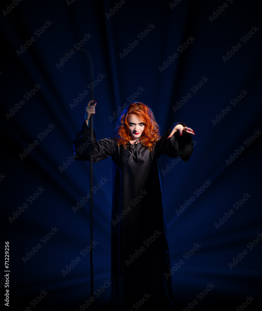 Witch isolated on blue rays background Witch isolated on blue rays background