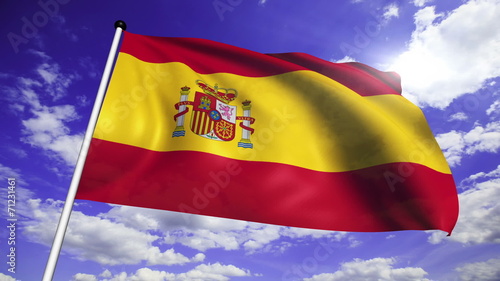 flag of Spain with fabric structure against a cloudy sky