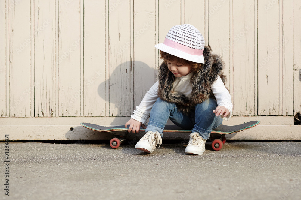 little hipster girl with skateboard portrait little hipster girl with skateboard portrait
