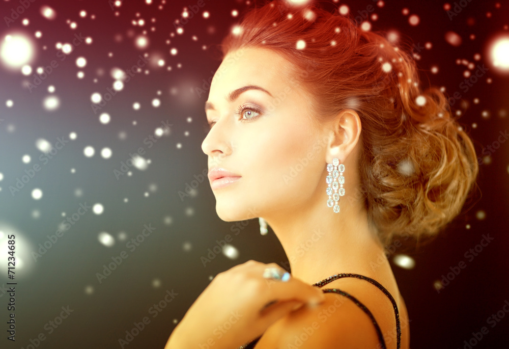 woman with diamond earrings woman with diamond earrings