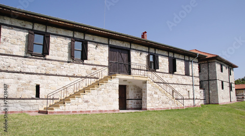 White stone house with stairs