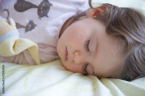 Closeup portrait of cute sleeping baby.