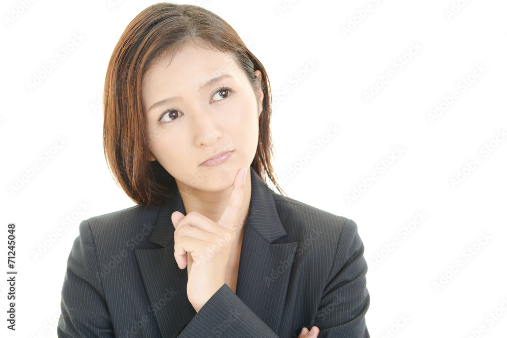 困惑した表情のOL 困惑した表情のOL