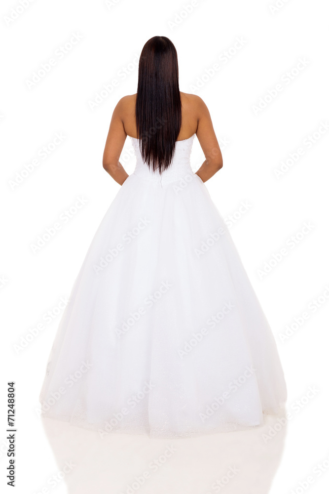 back view of woman in wedding dress back view of woman in wedding dress