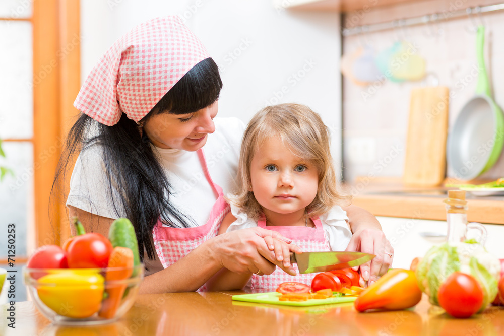 mom and kid girl preparing healthy food mom and kid girl preparing healthy food