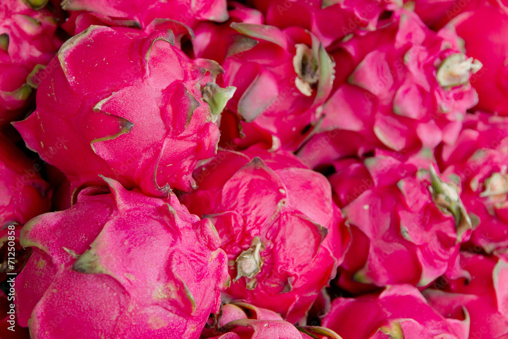 stack of dragon fruit in market background stack of dragon fruit in market background