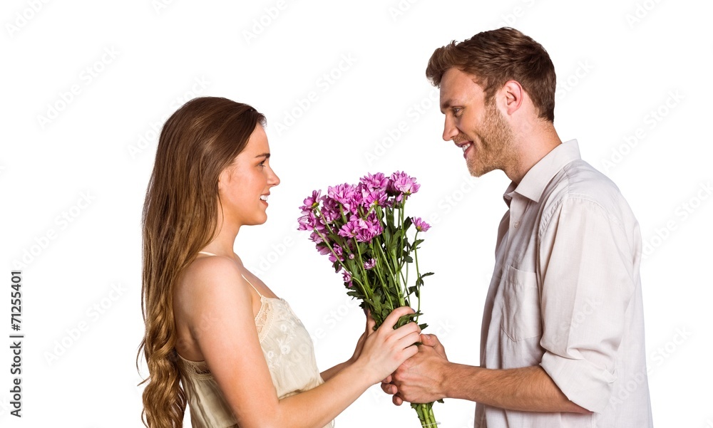 Side view of couple holding flowers
