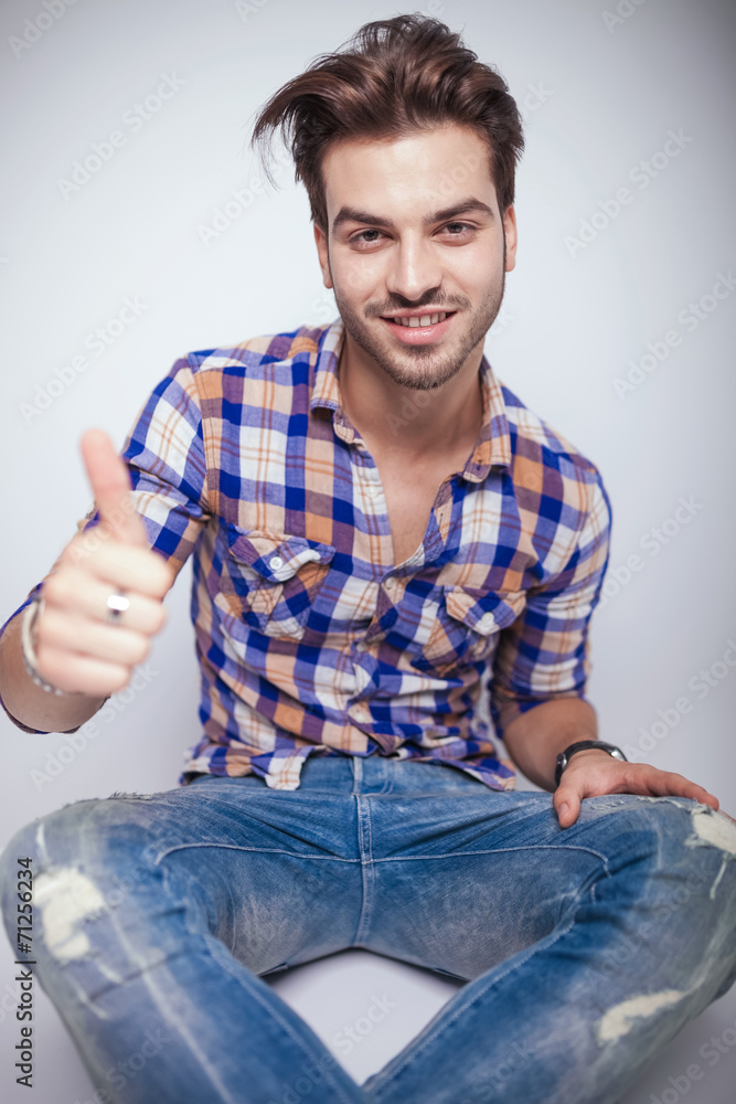 young fashion man smiling for the camera young fashion man smiling for the camera