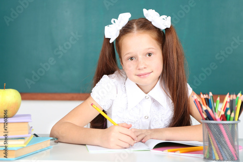 Cute girl at workplace in c...