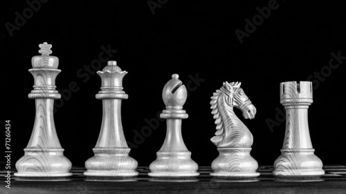 Chess pieces in line