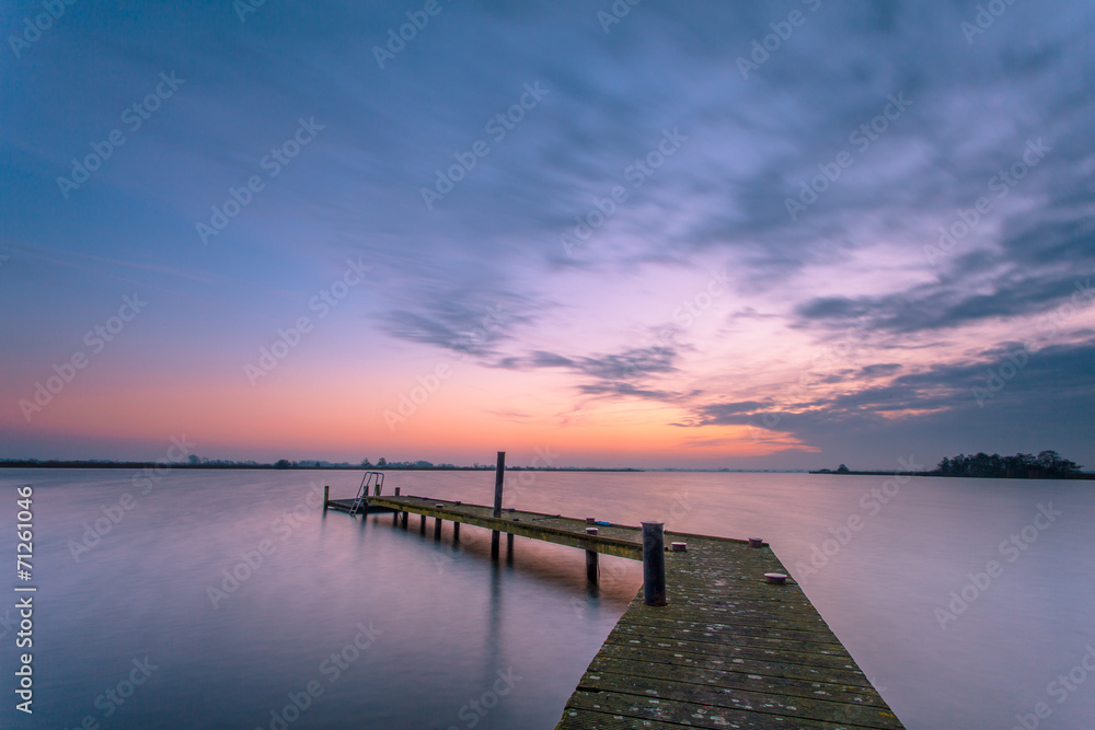 Purple dusk over a tranquil lake