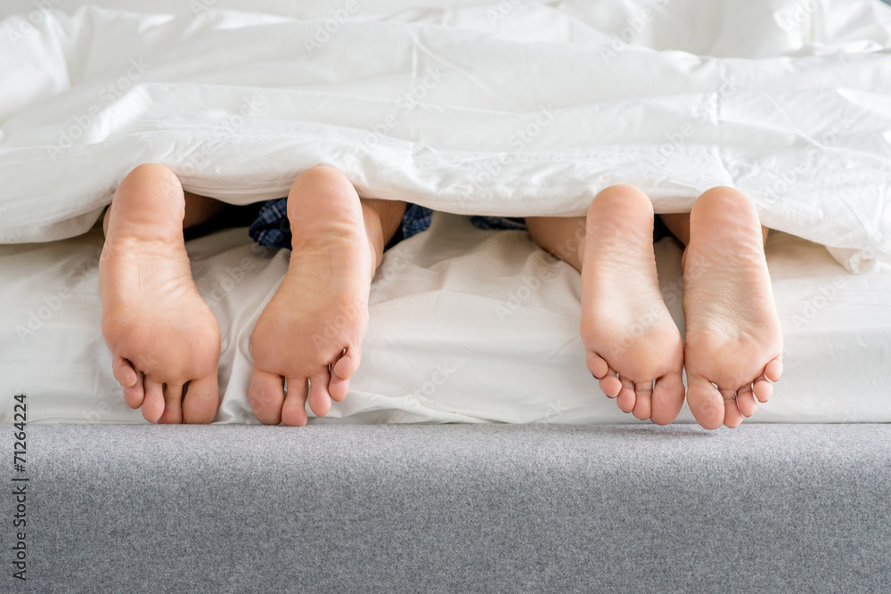 Sweet Couples Feet Soles on Bed Sweet Couples Feet Soles on Bed