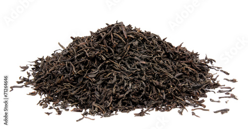 Dry black tea leaves isolated