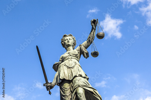 Justitia (Lady Justice) sculpture on the Roemerberg square in Fr