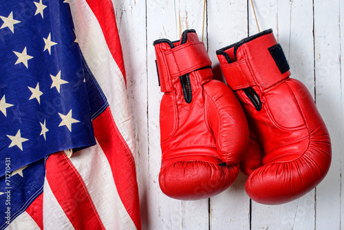 red boxing gloves with an American flag © Philipimage