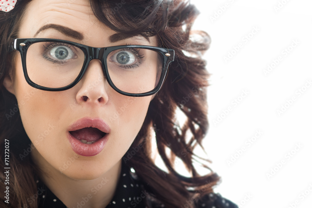 Obraz premium Amazedly young woman with open mouth.