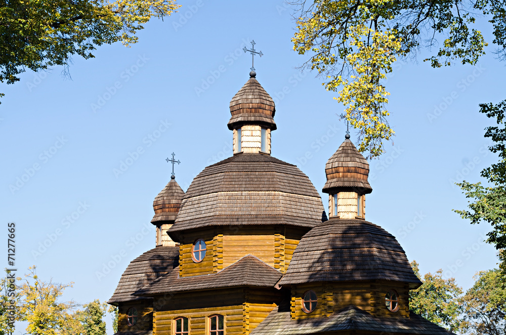 wooden church against the blue sky