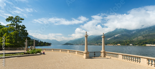 Wide angle view of Lake Como seen from a romantic terrace