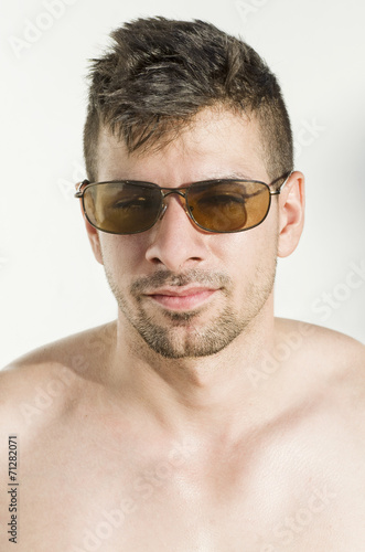 Young and attractive man with sunglasses.