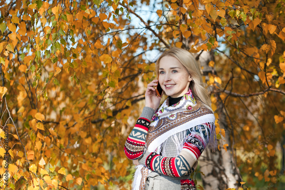 Portrait of a beautiful young woman calling by phone Portrait of a beautiful young woman calling by phone