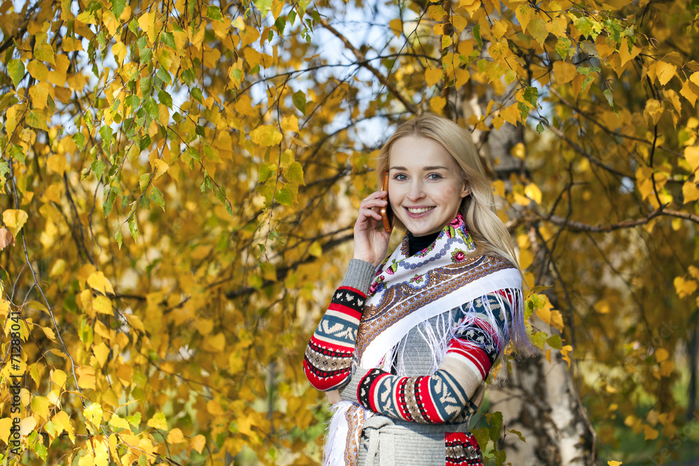 Portrait of a beautiful young woman calling by phone Portrait of a beautiful young woman calling by phone