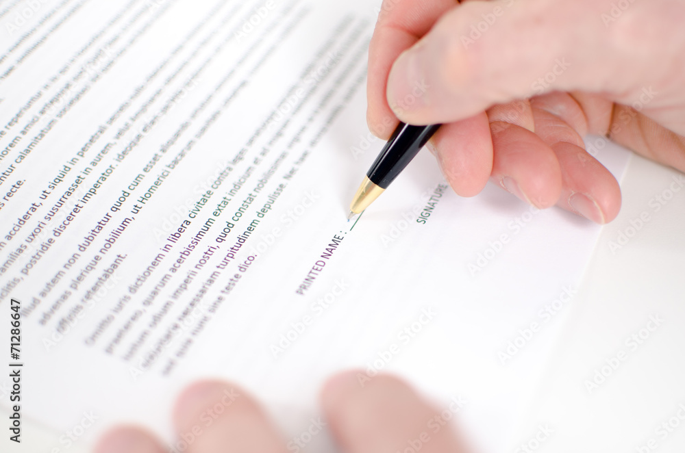 Hand signing contract Hand signing contract