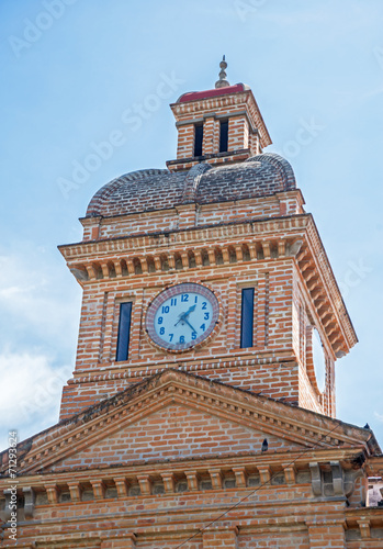 Steeple of an old church made of brick, Ibarra, Ecuador photo