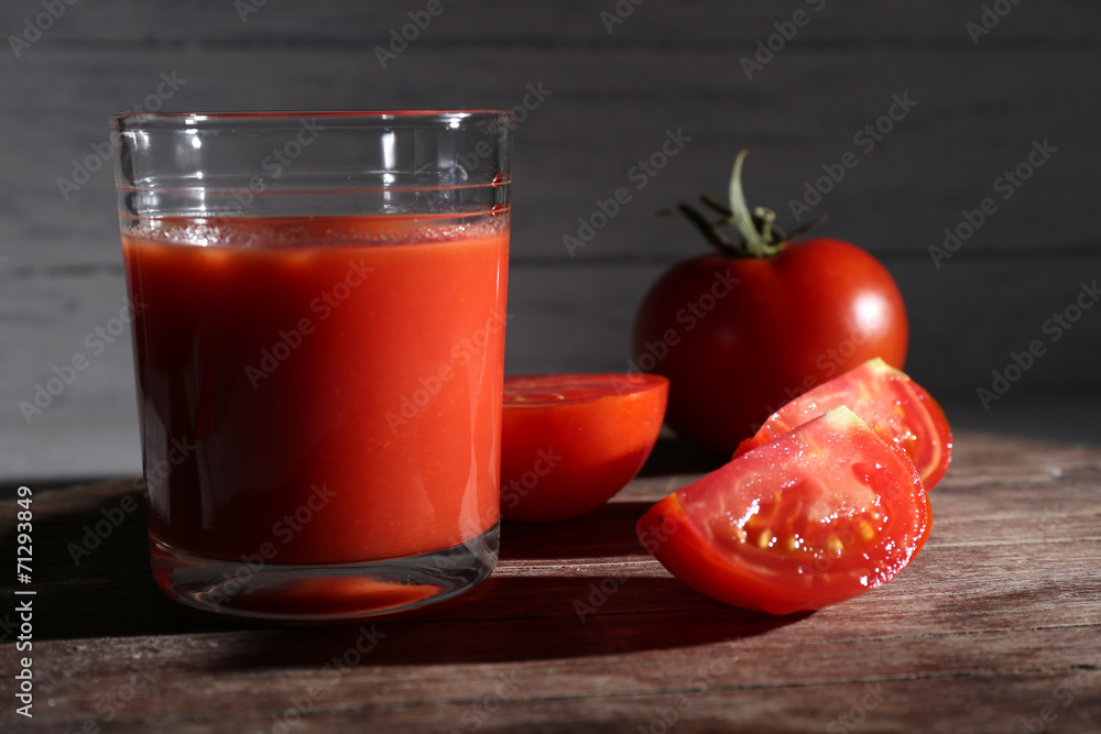 glass of tomato juice with spices and fresh tomatoes glass of tomato juice with spices and fresh tomatoes