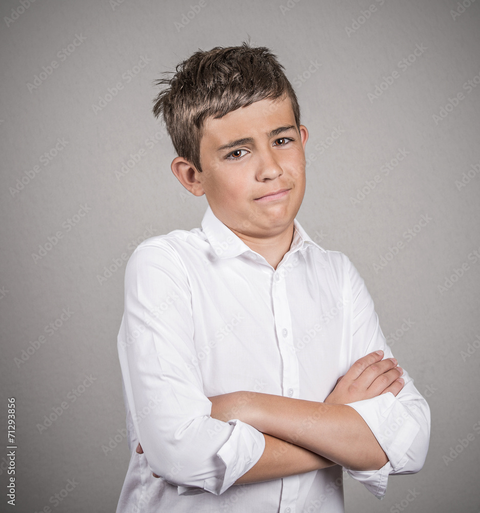 skeptical young man looking at you isolated on grey background skeptical young man looking at you isolated on grey background