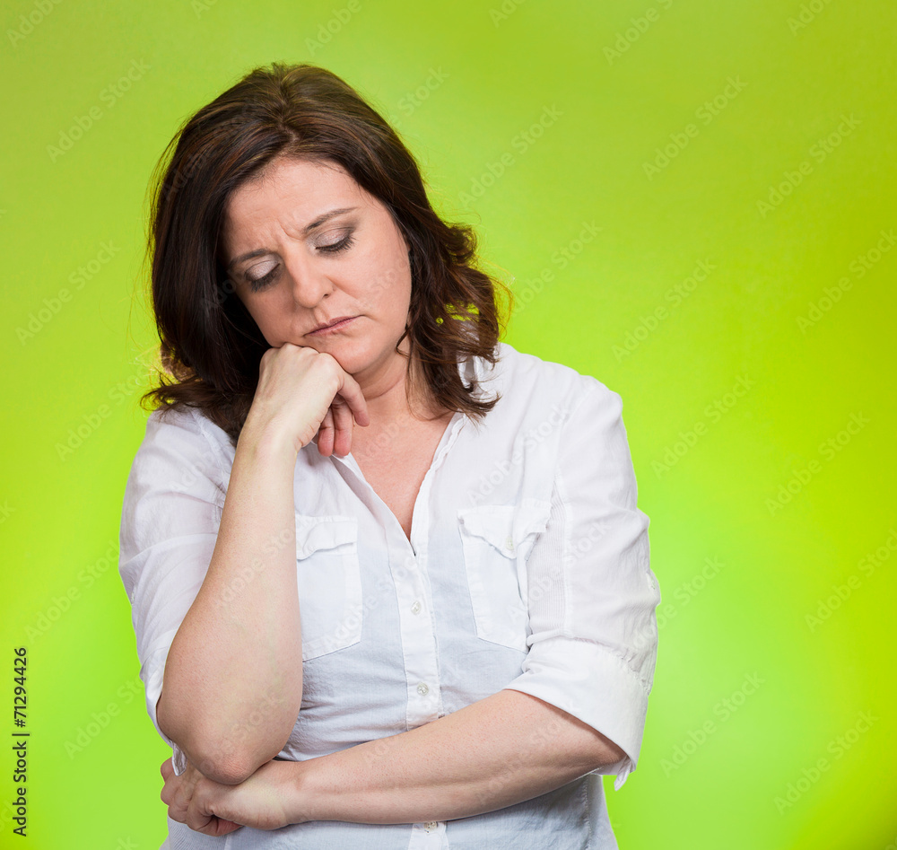 Portrait depressed gloomy woman on green background Portrait depressed gloomy woman on green background