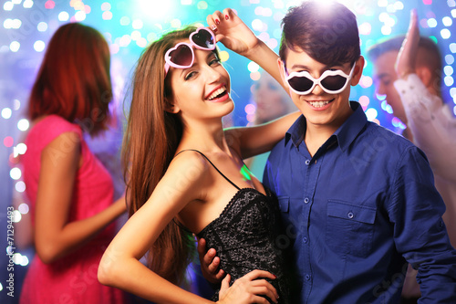 Young people dancing at party