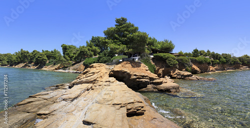 Panorama of the stone ledge in the Aegean Sea.