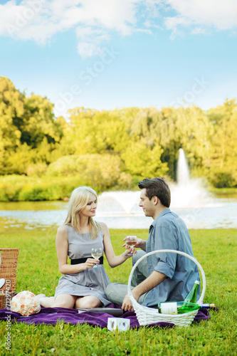 Couple having romantic date in the park