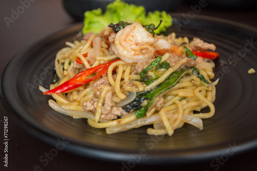 Spaghetti seafood in black dish