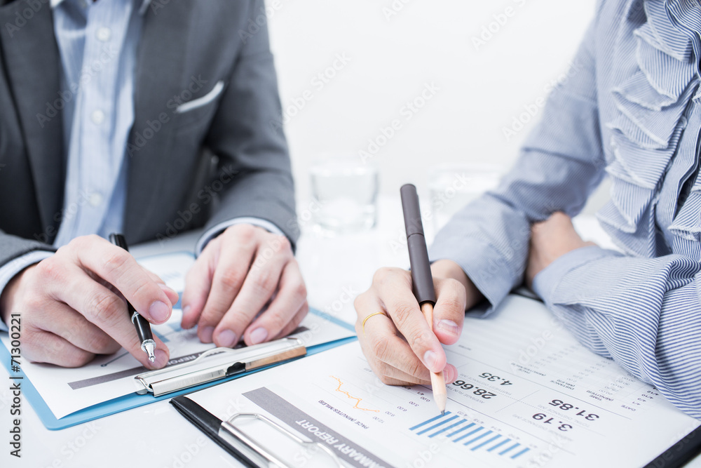 Business people discussing during a meeting Business people discussing during a meeting