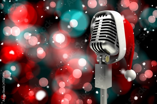 Composite image of microphone with santa hat