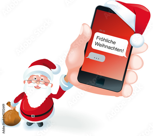 Weihnachtsmann hält Smartphone mit SMS Fröhliche Weihnachten