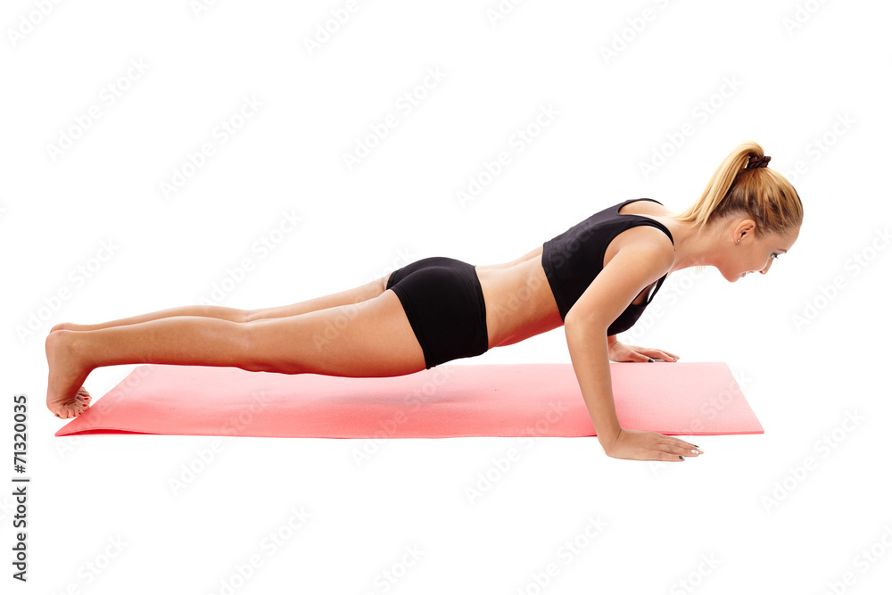Fitness girl doing push ups Fitness girl doing push ups