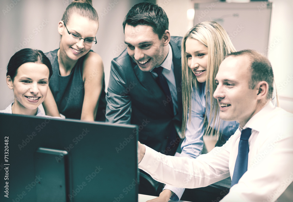 business team with monitor having discussion business team with monitor having discussion