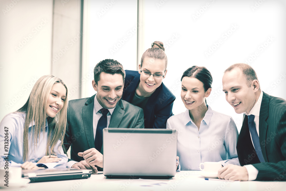 business team with laptop having discussion business team with laptop having discussion