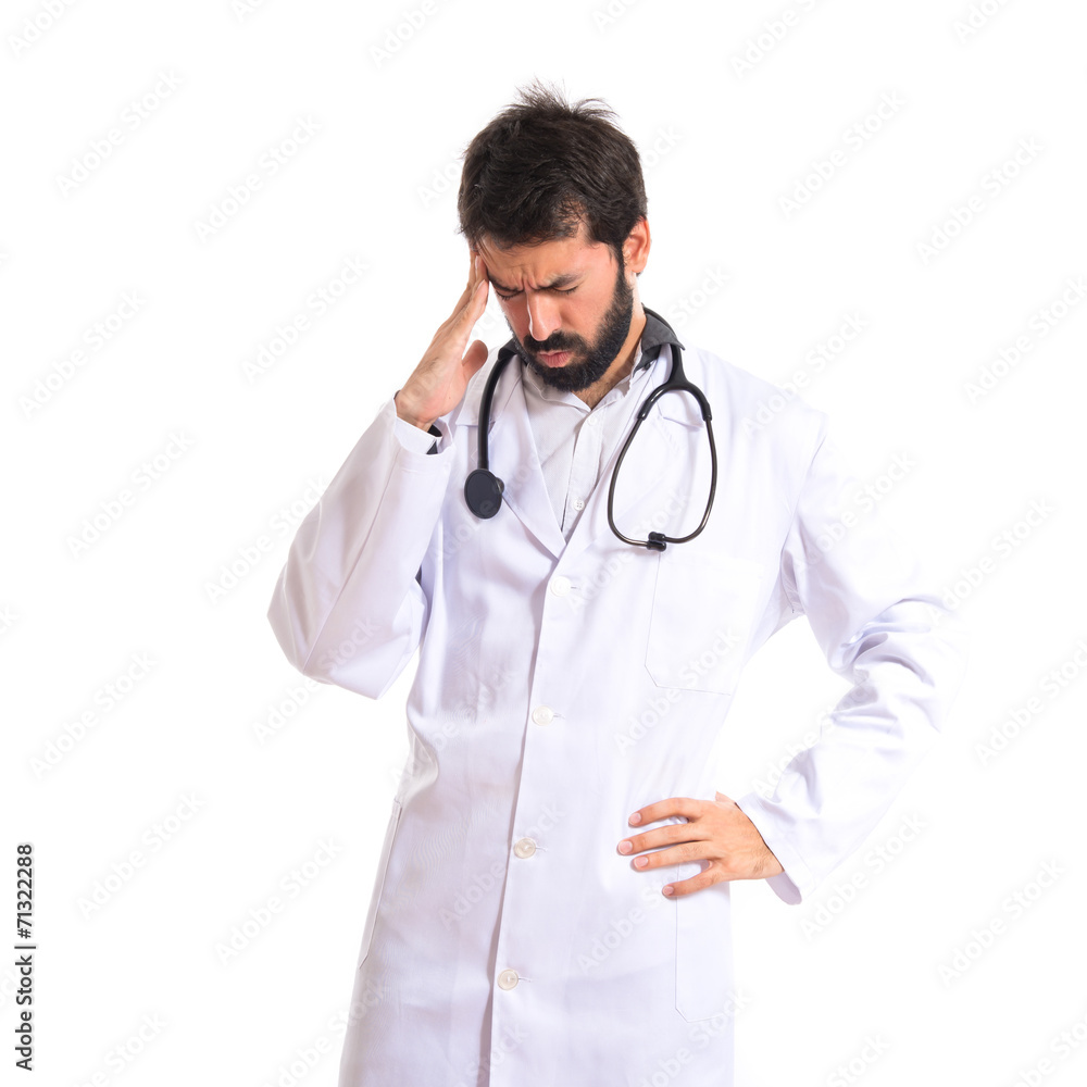 Frustrated doctor over isolated white background Frustrated doctor over isolated white background