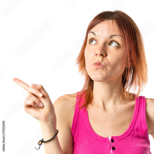 Girl thinking over isolated white background