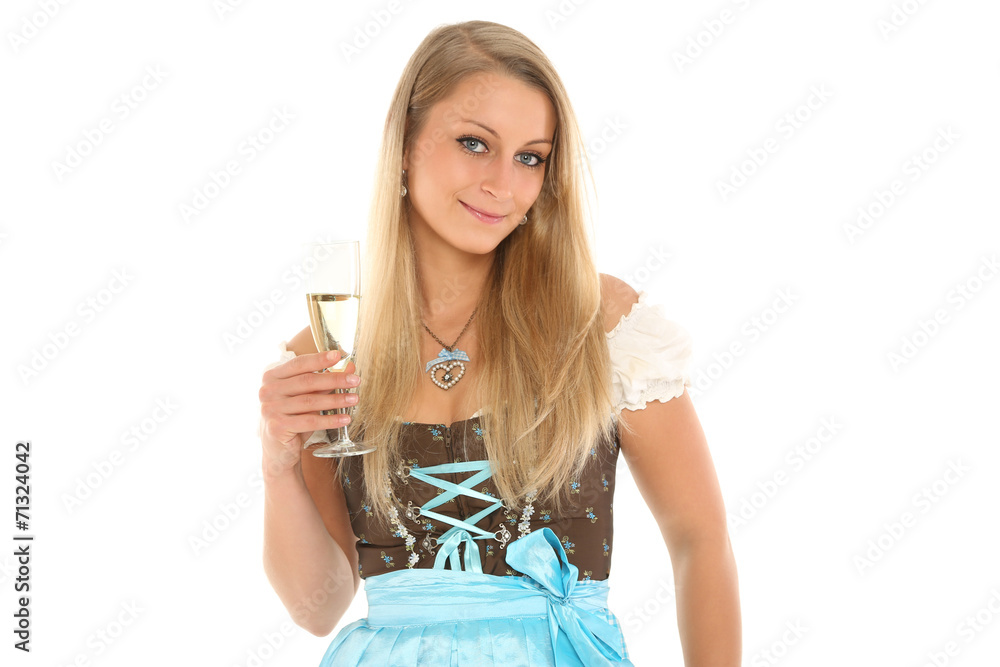 Junge Frau im Dirndl mit Prosecco Junge Frau im Dirndl mit Prosecco