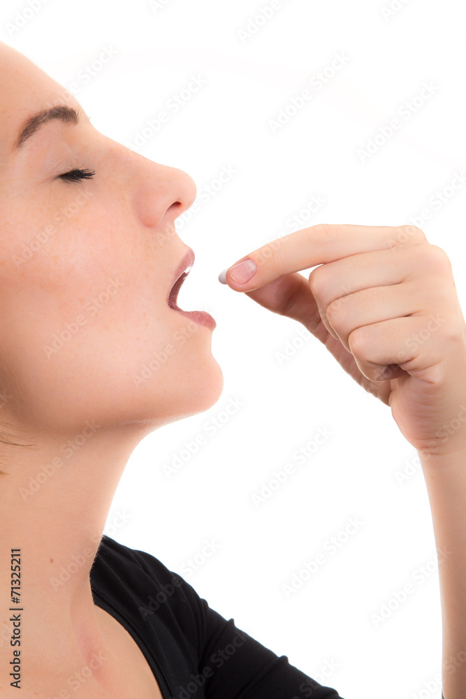 woman taking pill