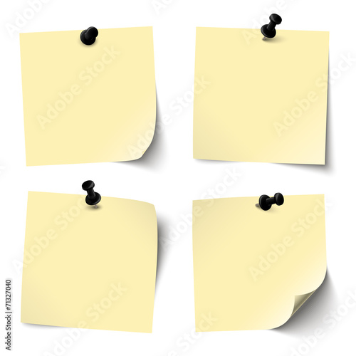 collection of colored sticky papers with black pin needle