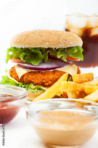 Chicken burger and glass of cola