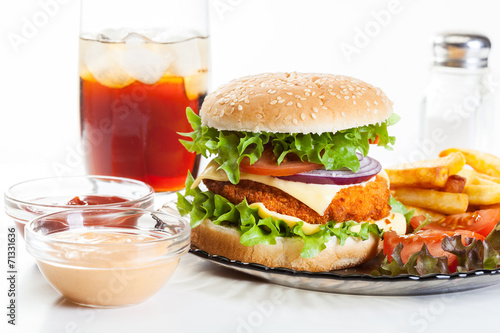 Chicken burger and glass of cola